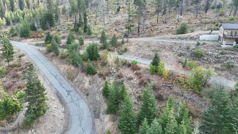 The switchback gravel drive seen from above